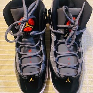 Jordan Kids Black and Gray Sneakers with Red Accents